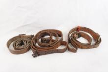 Three leather rifle slings with swivels