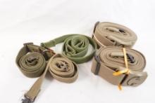 Two 10 ft adjustable straps with 2' plastic buckles and three canvas military rifle slings