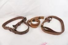 Three leather rifle slings with swivels