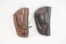 Two Down Under Bison RH leather holsters, one black and one brown, new
