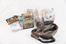 One Realtree Boonie packer sling, three butt stock rifle ammo holders, a survival saw and two