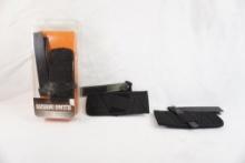 Three Blackhawk compact belt slide holsters, fits most revolvers and autos ,in pkg