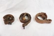 Three leather rifle slings with swivels