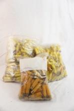 Three bags of fired 20 gauge shell hulls for reloading, approx 650 count