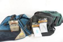 One blue Plano fishing tackle bag, two small range bags, two new survival blankets and a survival