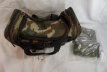 One NexPak camo range duffle bag new with tags and a canvas magazine pouch with leather closures