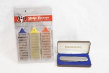 Browning stainless steel pocket knife with two blades and folding scissors in metal case and one