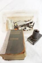 Box of misc tools and a metalworking book