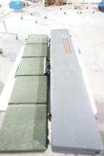 Two padded rifle cases, one Woodstream double sided case and one green single case