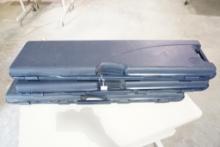 Three Beretta shotgun cases