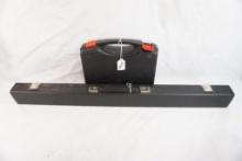 One barrel/pool stick case with padding and one hard handgun case with no padding