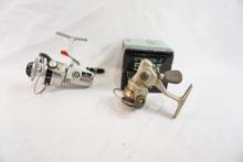 Two Daiwa spinning reels, one 1300C and one 500 T in box