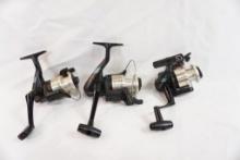 Three Shimano Aero Solstace spinning reels, one 2500, one 1000 and one 2000