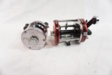 Two Abu Garcia Ambassadeur baitcasting reels, one is a 5500C and one 7000