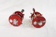Two Abu Garcia Ambassadeur baitcasting reels, one is a 5000