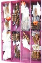 Plastic box of shotgun cleaning brushes and mops