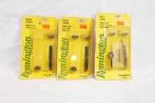 Three pkgs of Remington gun parts, two front sights and one bolt parts