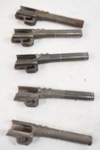 Five used pistol barrels, appear to be 9MM