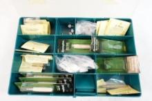 Plastic Box of gun cleaning mops, adapters,etc new in pkgs