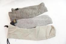 Three used gun socks, one rifle and two handgun