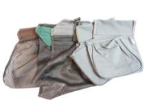 Three mesh shotgun shell empties bags and two accessories pouches