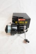 One Mitchell 330 spinning reel in box