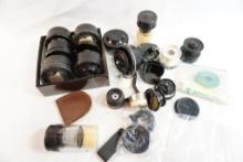 Bag of Mitchell replacement spools, parts and other reel parts