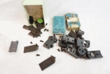 Bag of scope rails and bases with screws