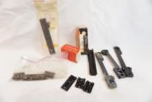 Box of assorted weaver type scope bases and rails