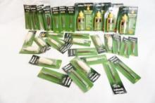 Bag of gun cleaning supplies including bore cleaner, brushes and mops