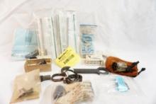 Bag of misc gun parts, some new in pkg