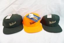 Three new Woolrich caps one blaze orange and two hunter green