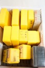 Twelve plastic ammo boxes