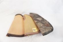 Three canvas padded pistol cases