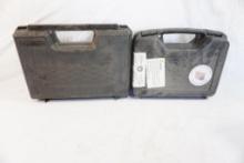 Two plastic pistol boxes