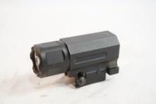 Tactical quick release flashlight