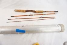 Small aluminum rod case with fishing rod