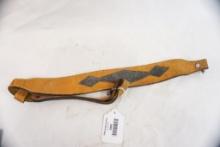One leather Cobra rifle sling.
