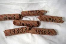 Bag containing 6 rolls of wheat pennies, one 1920's, one 1930's and four 1940's