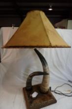 One cow horn lamp.
