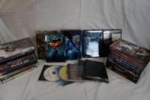 One box of miscellaneous DVD, movies, etc. Count 34.