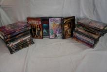 One box of miscellaneous DVD, movies, etc. Count 28.