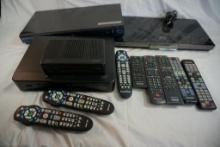 Box of miscellaneous DVD, and Blu Ray players with control boxes, etc.