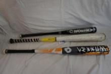 Two aluminum baseball bats, and one composite bat.