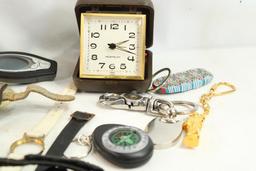 Large bag of watch bands, faces, key chains, clock and other misc items