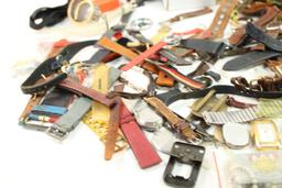 Large bag of watch bands, faces, key chains, clock and other misc items