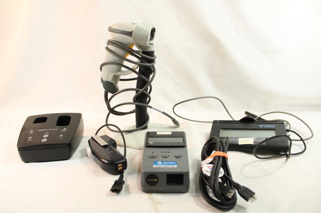 Box containing a Topaz system signature LCD, Alarm Lock infrared printer, Symbol barcode scanner