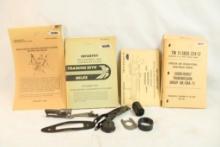 Four books, infantry field guides etc, and bag of miscellaneous gun parts