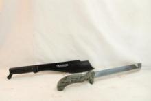Two machetes, one Takedown with 11" blade and one Camillus Carnivore with 12" blade, both in nylon