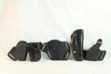 Five leather holsters